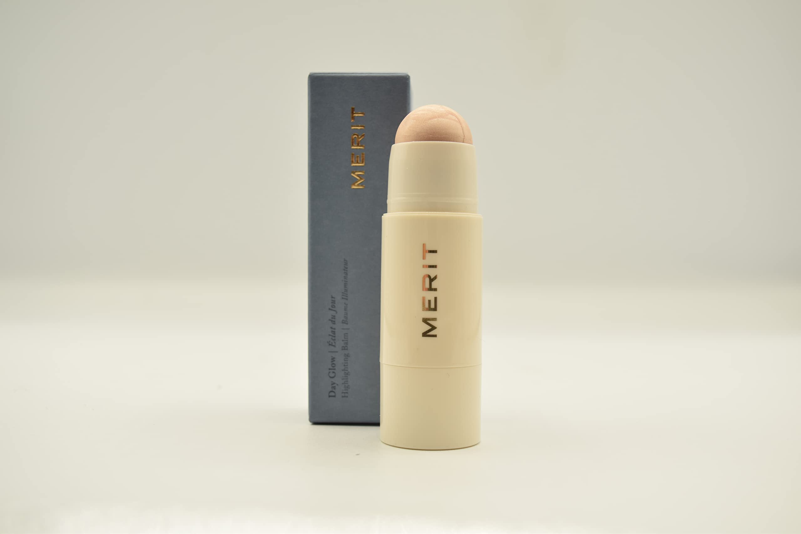 Merit Day Glow Dewy Balm Cava swirls on skin for a dewy radiance