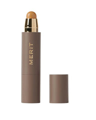 Merit Minimalist Camel stick application close-up for natural, on-the-go coverage.