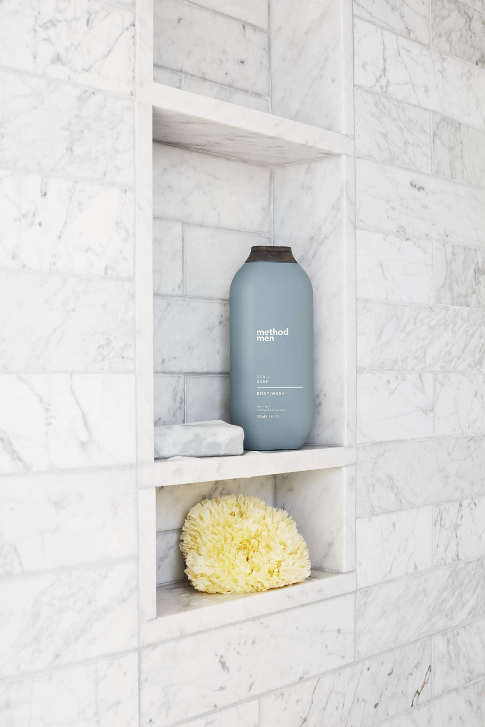 Forest-inspired Cedar + Cypress fragrance showcased on the bottle.