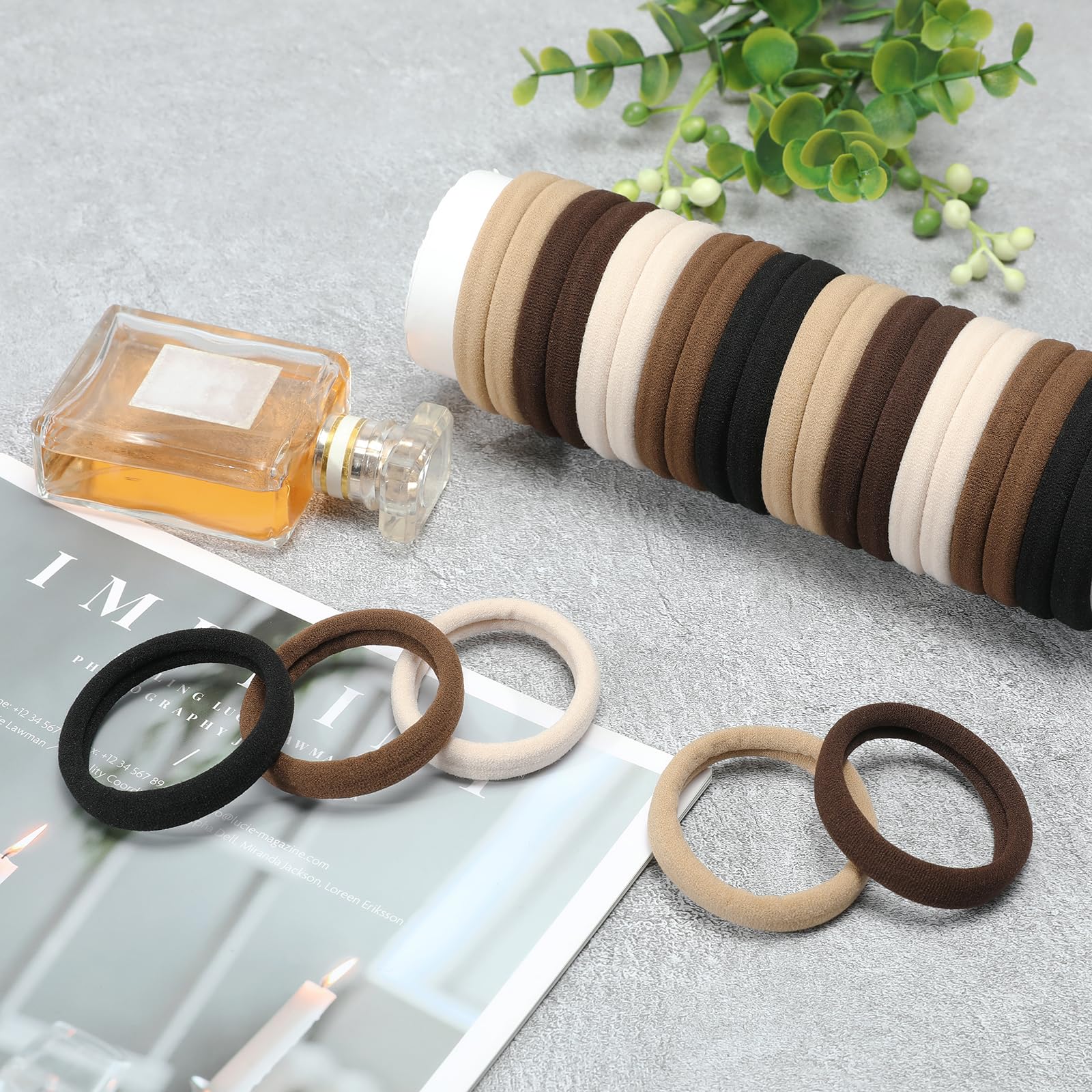 Mia Klein hair ties black on dresser tray highlighting stylish seamless look