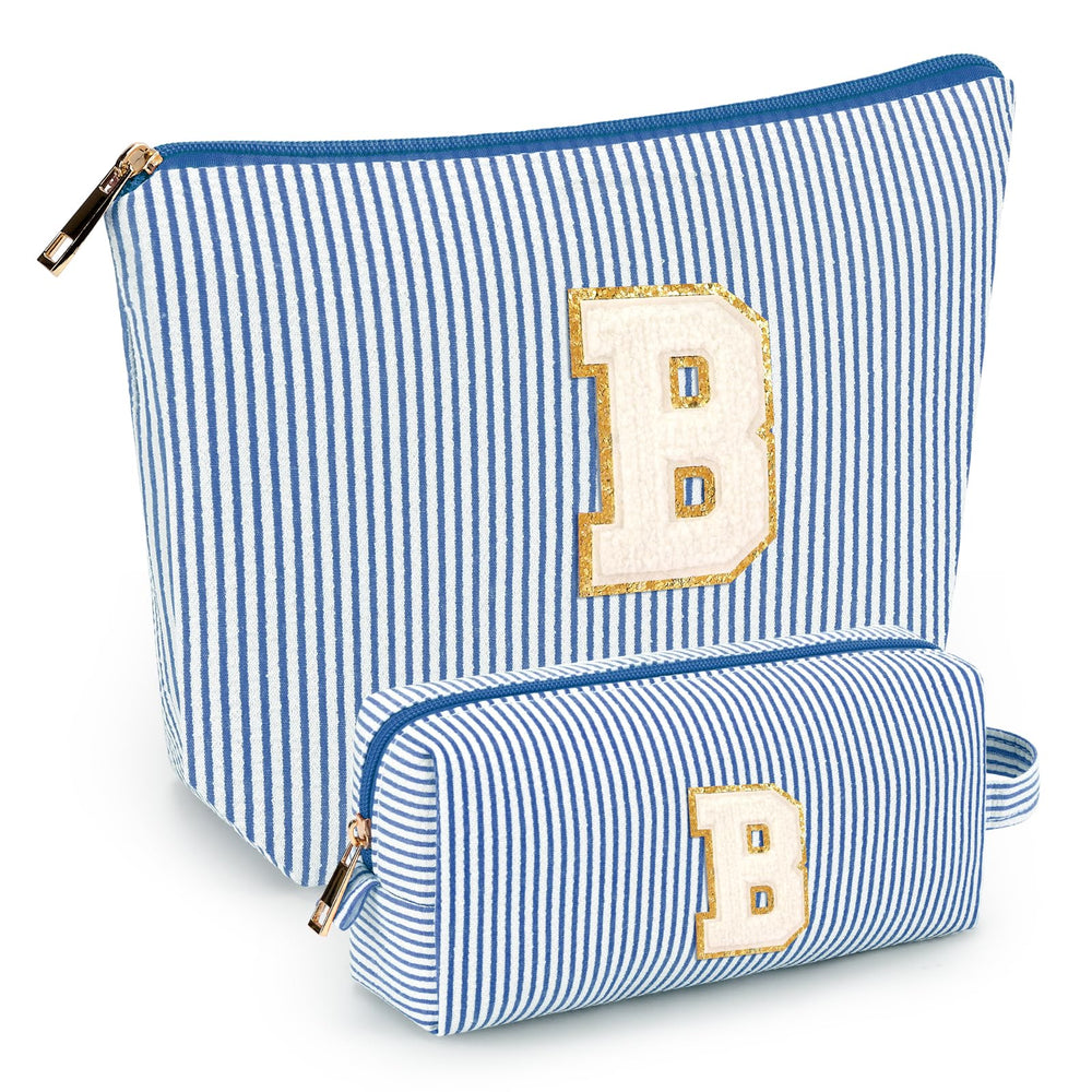 Mibasies initial makeup bags in blue front view, travel-ready cosmetics organizer