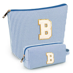 Mibasies initial makeup bags in blue front view, travel-ready cosmetics organizer
