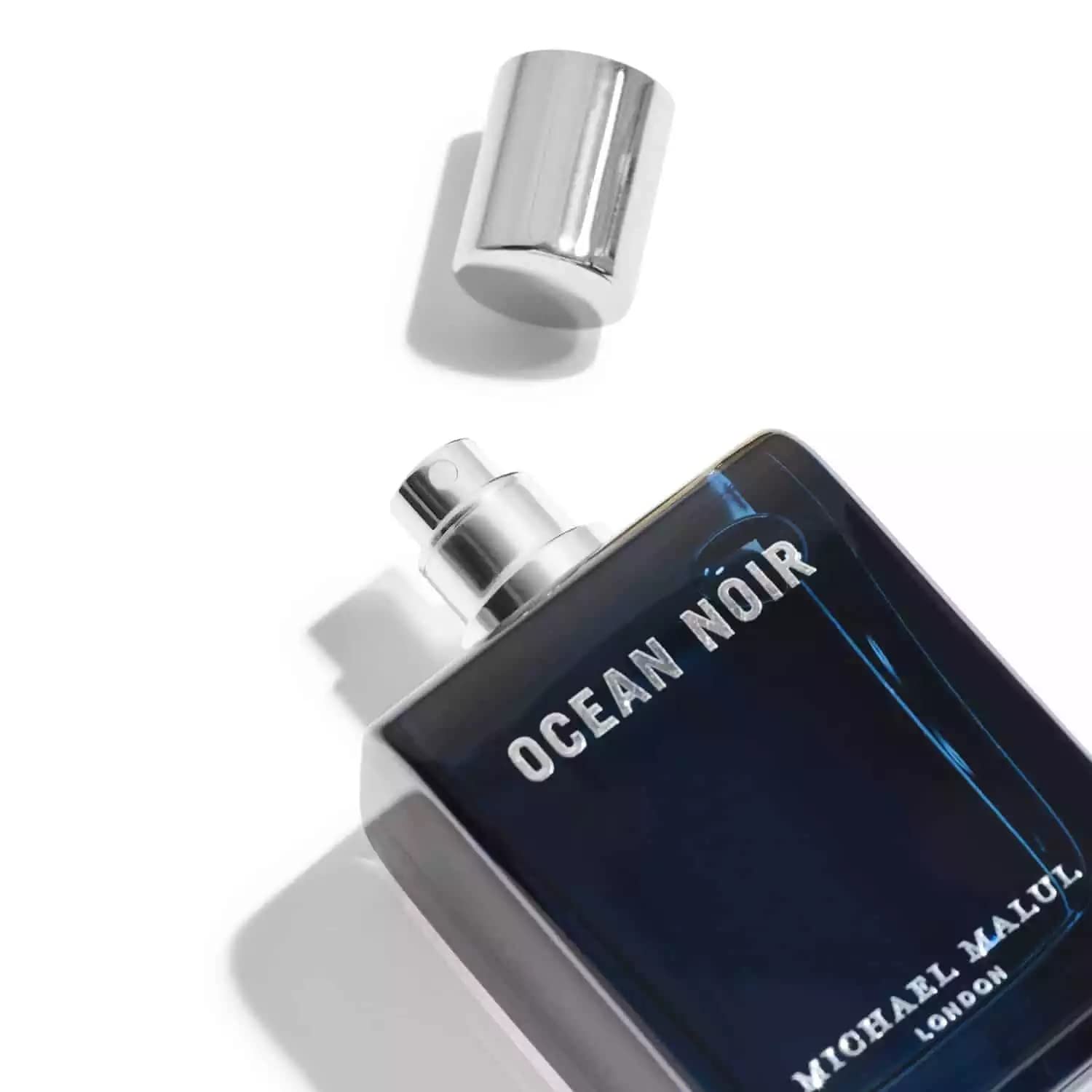 Michael Malul Ocean Noir splash-shot evokes fresh marine freshness.