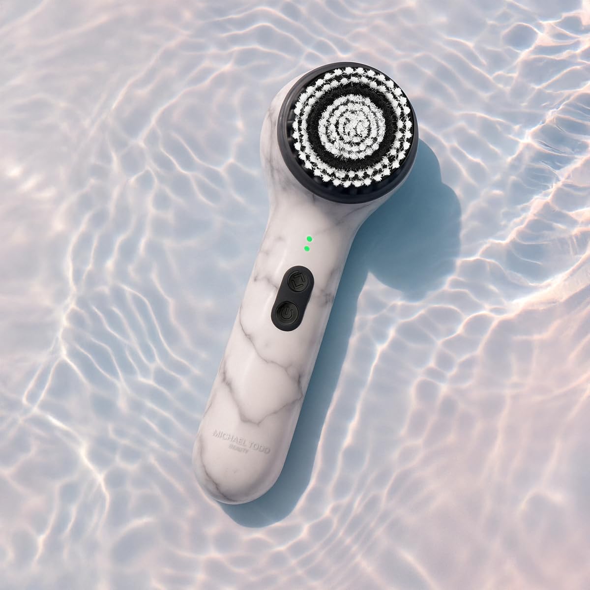 Michael Todd Beauty replacement brush head shown fitting Soniclear Elite and Petite for daily use.