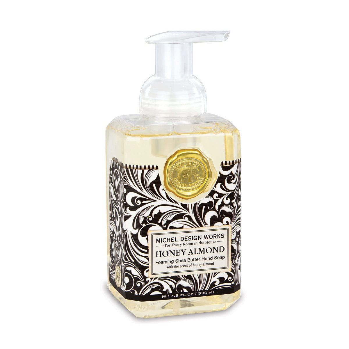 Michel Design Works Honey Almond bottle close-up highlighting moisturizing foaming soap