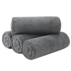 MICROFI microfiber hair drying towel—absorbent gray fabric quickly soaks up water.