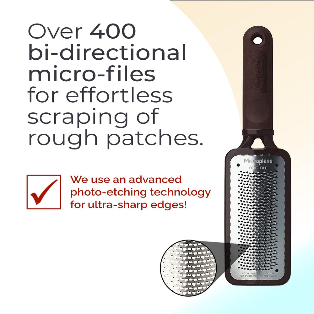 Microplane Colossal Foot File dead skin removal action shows efficient smoothing of rough patches.