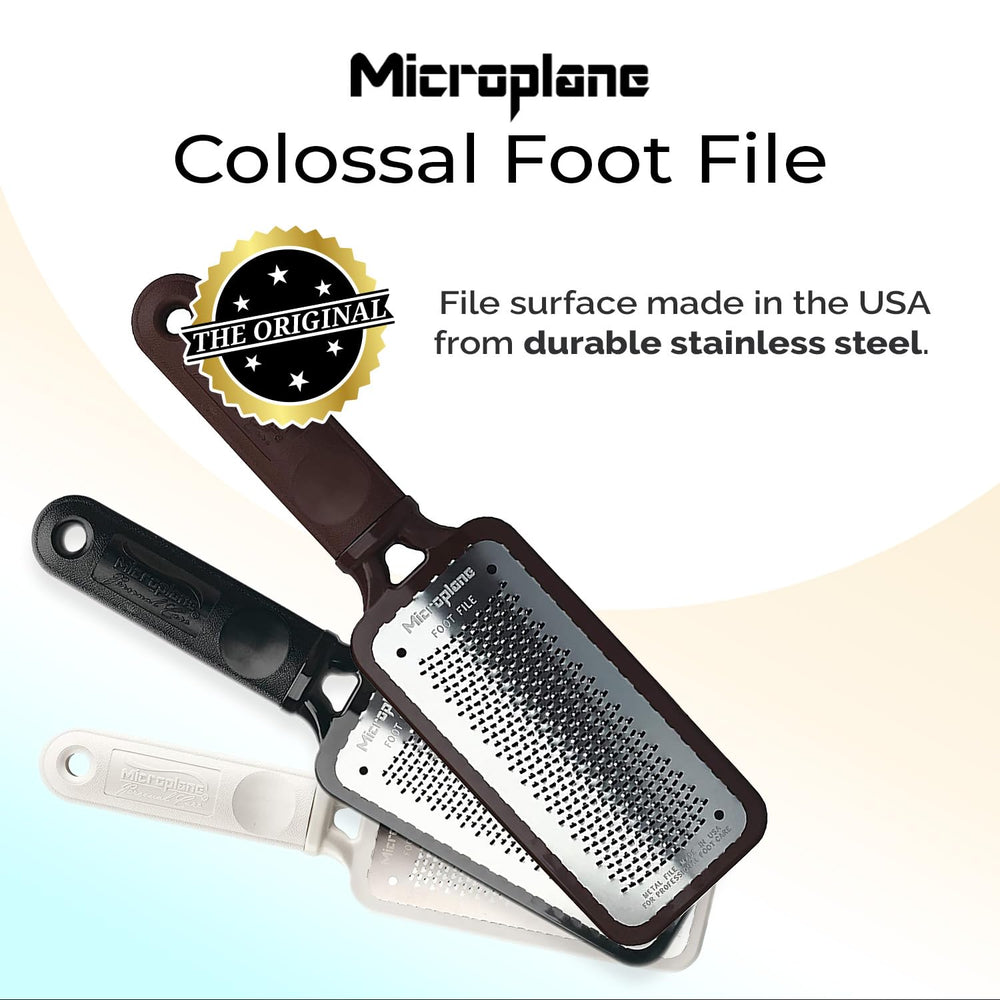 Microplane Colossal Foot File wet-use close-up highlights rust-resistant steel for spa-like pedicures at home.