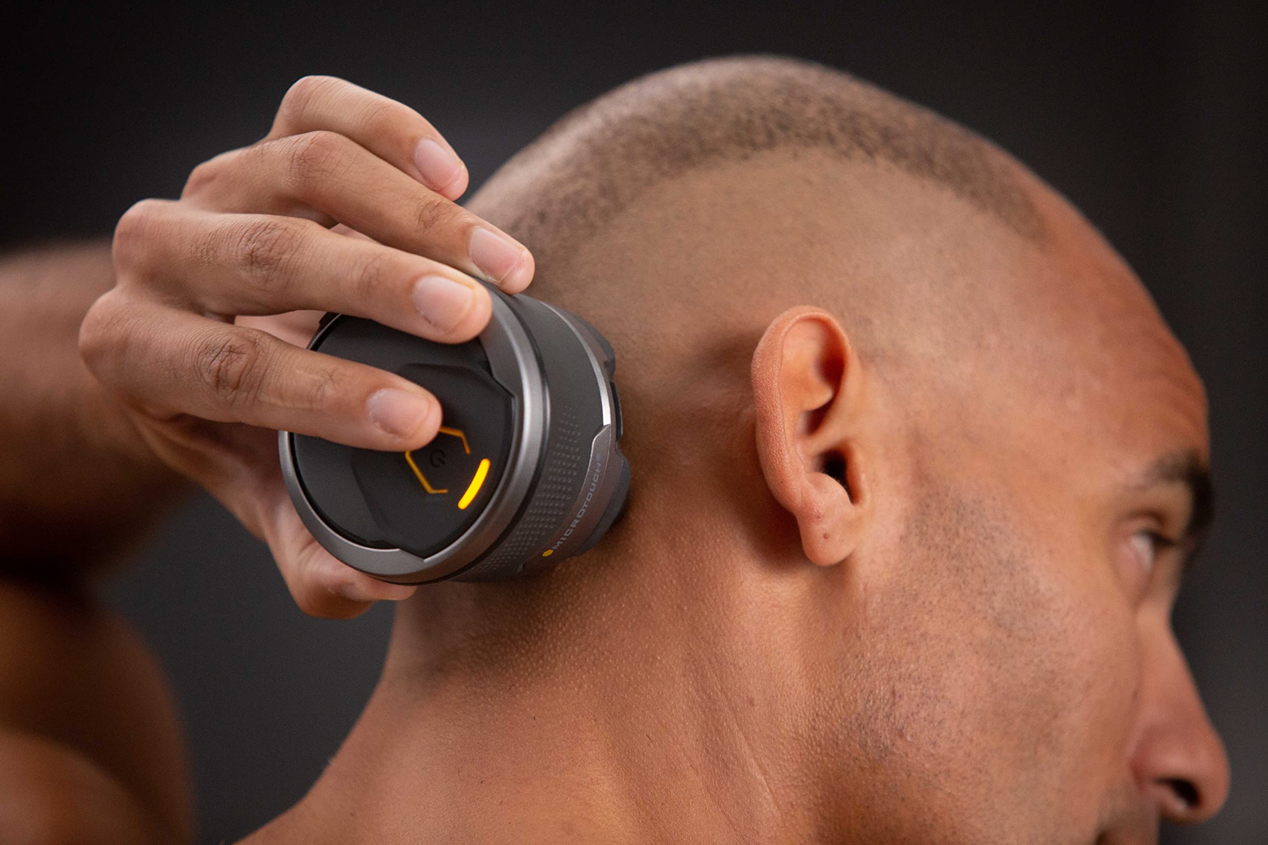 MicroTouch Titanium Head Shaver hair capture chamber for tidy post-shave cleanup.