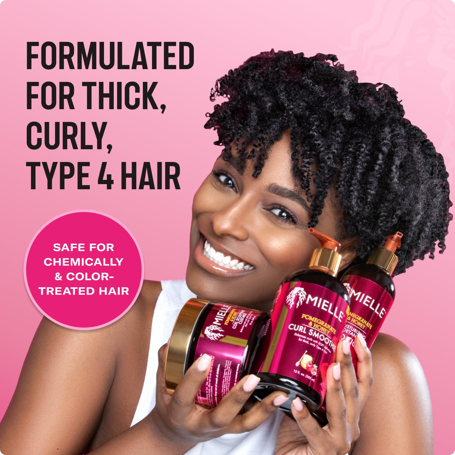Mielle Organics Pomegranate & Honey Detangling Conditioner bottle pump ready for easy application.