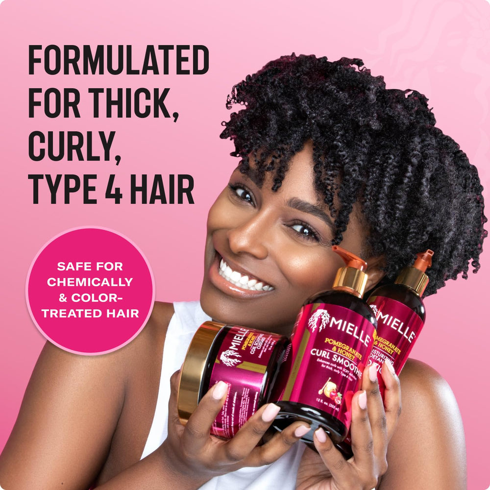 Mielle Organics Pomegranate & Honey Detangling Conditioner bottle pump ready for easy application.