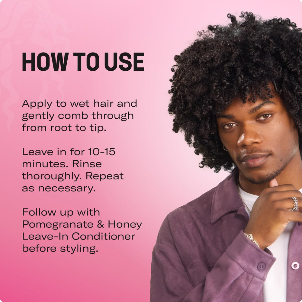 Mielle Organics Pomegranate & Honey Detangling Conditioner curly hair closeup highlights defined curls.