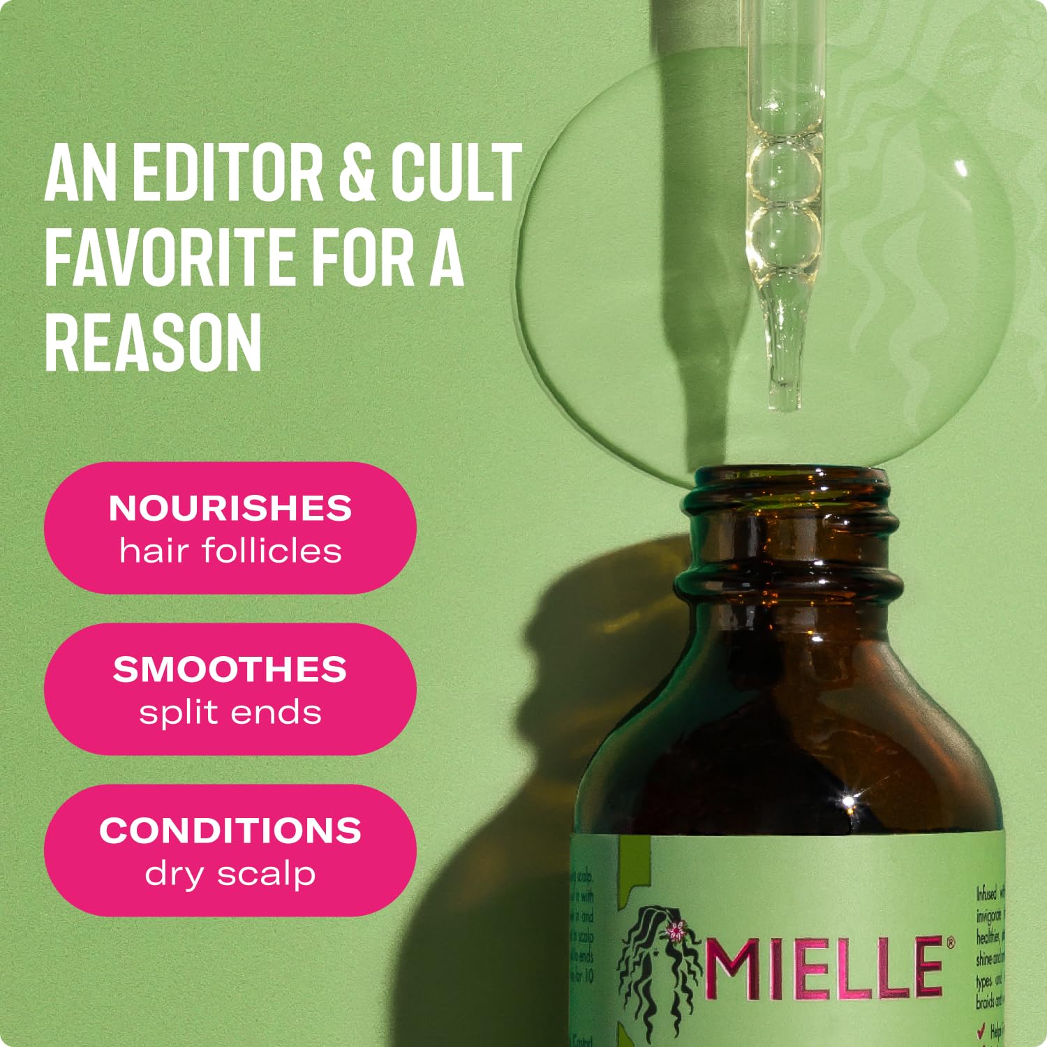 Mielle Organics Rosemary & Mint Hair Oil dropper demonstrates precise dosage for scalp treatment