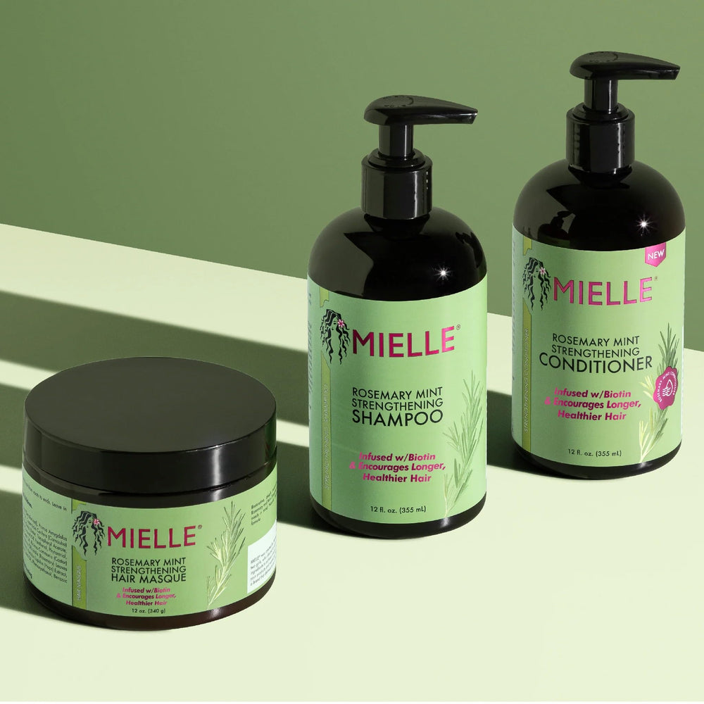 Mielle Rosemary Mint Leaves with bottle convey refreshing scent and spa-like experience