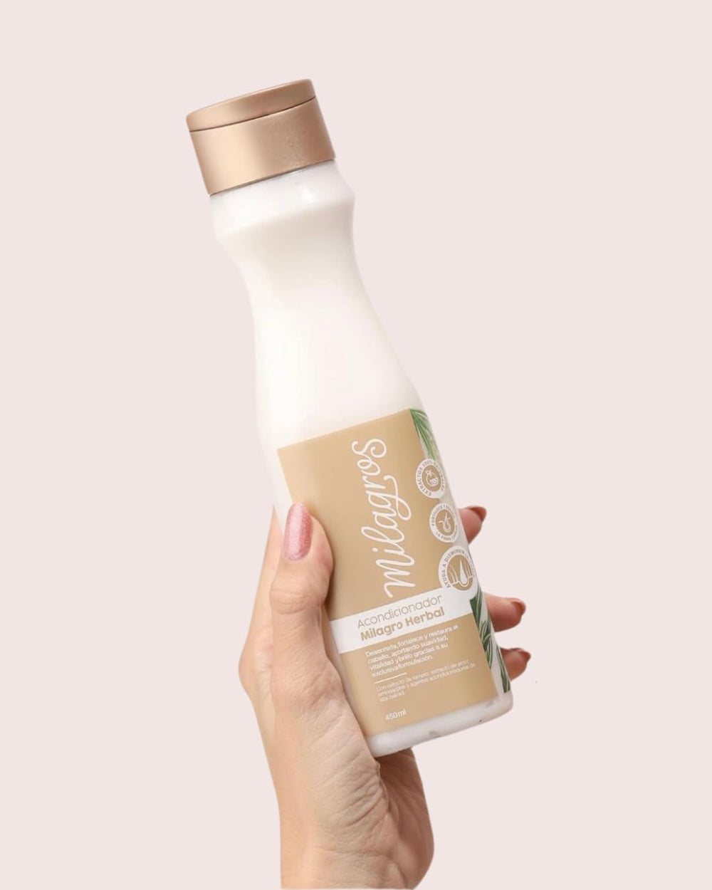 Milagros Herbal Conditioner bottle showcases detangling and smoothing benefits.