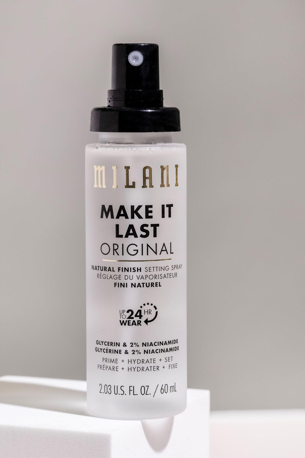 Milani Cooling fine-mist on face demonstrates refreshing spray experience