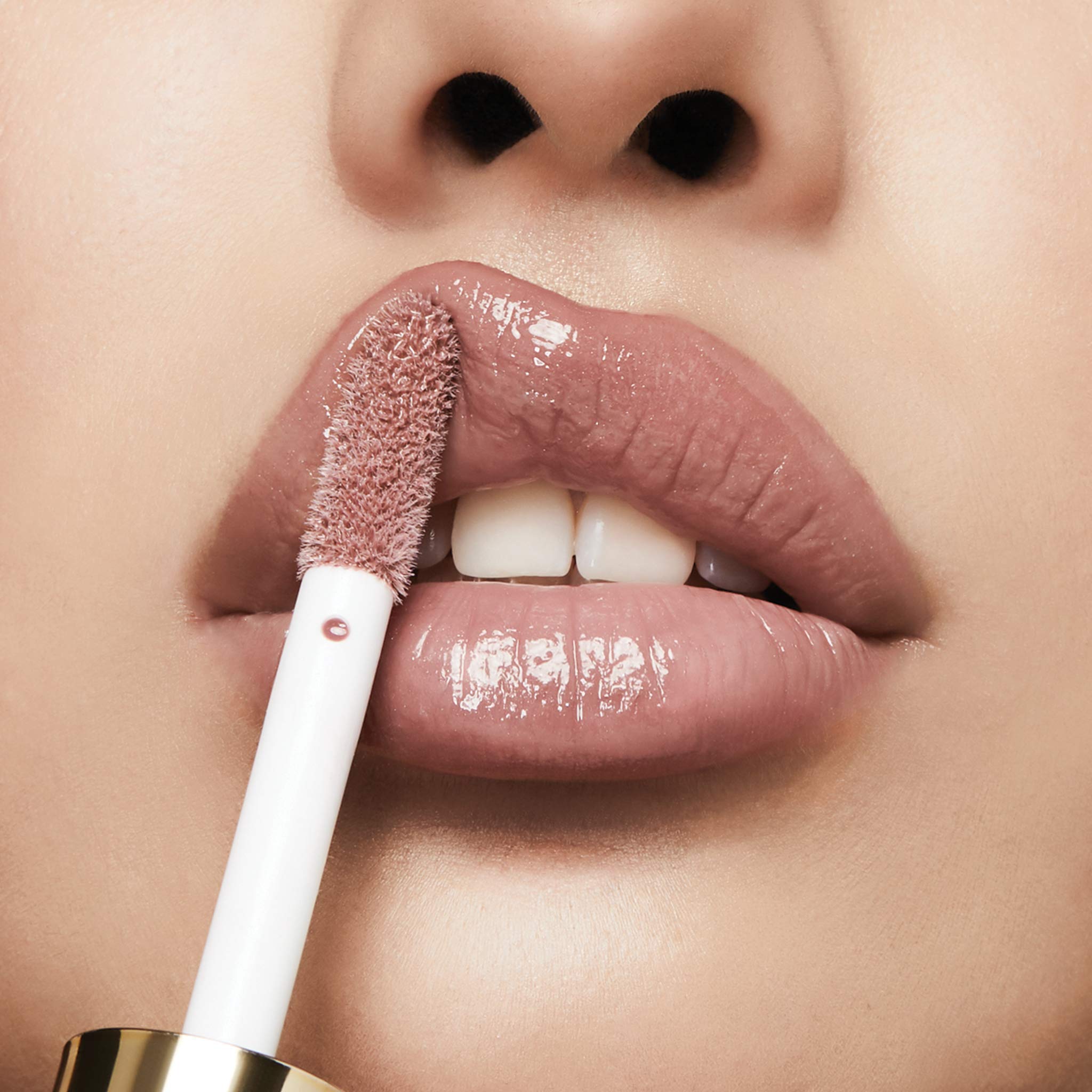 Front packaging of Milani lip gloss in Soft Rose