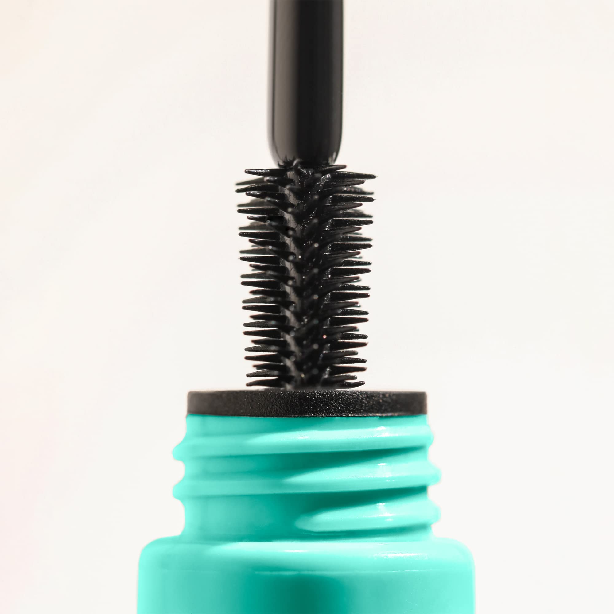 Milani Tubing Mascara shea butter ingredient close-up emphasizing lash nourishment.