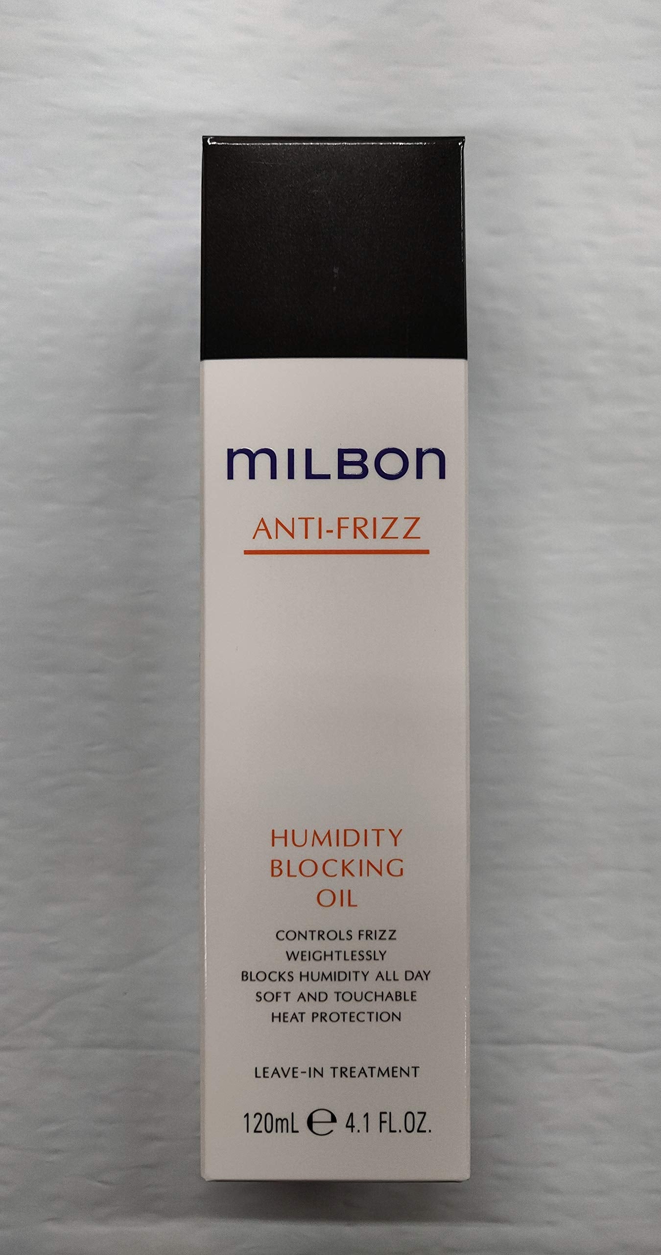 Milbon Anti-Frizz Oil bottle showing humidity-blocking, frizz-control for smooth waves.