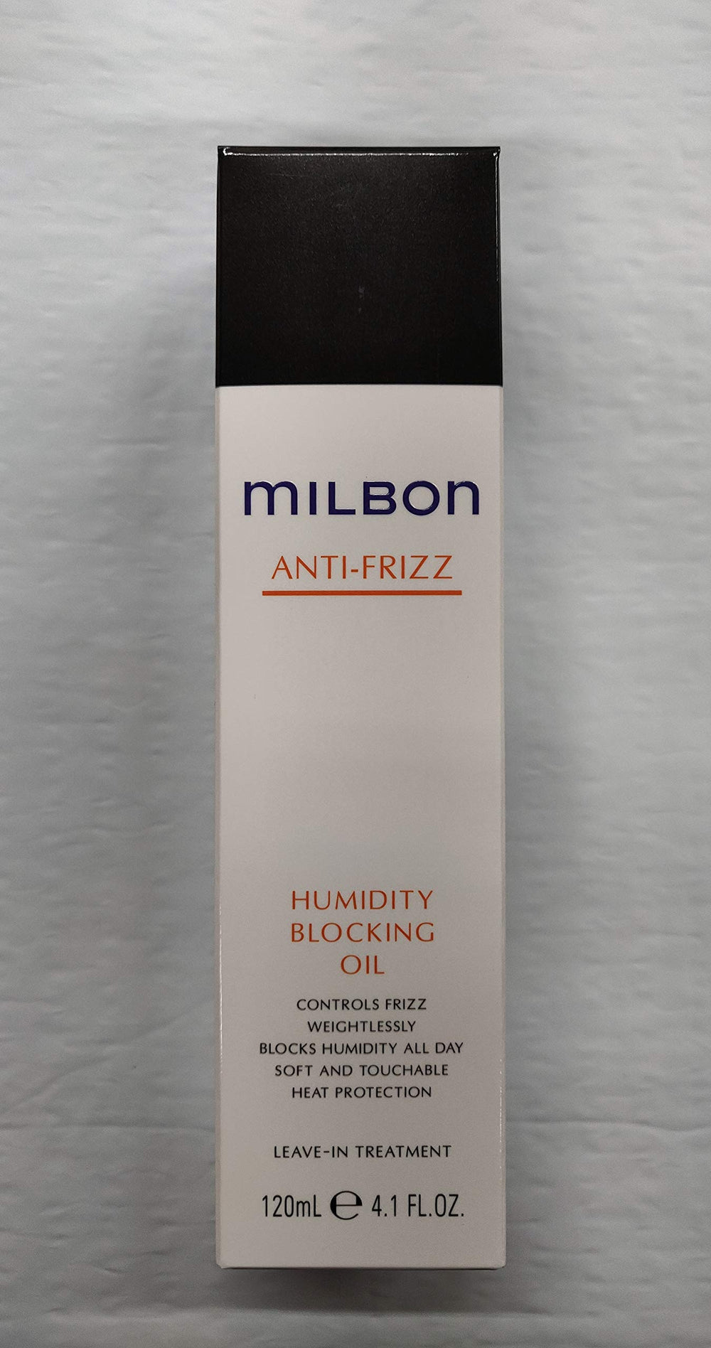 Milbon Anti-Frizz Oil bottle showing humidity-blocking, frizz-control for smooth waves.
