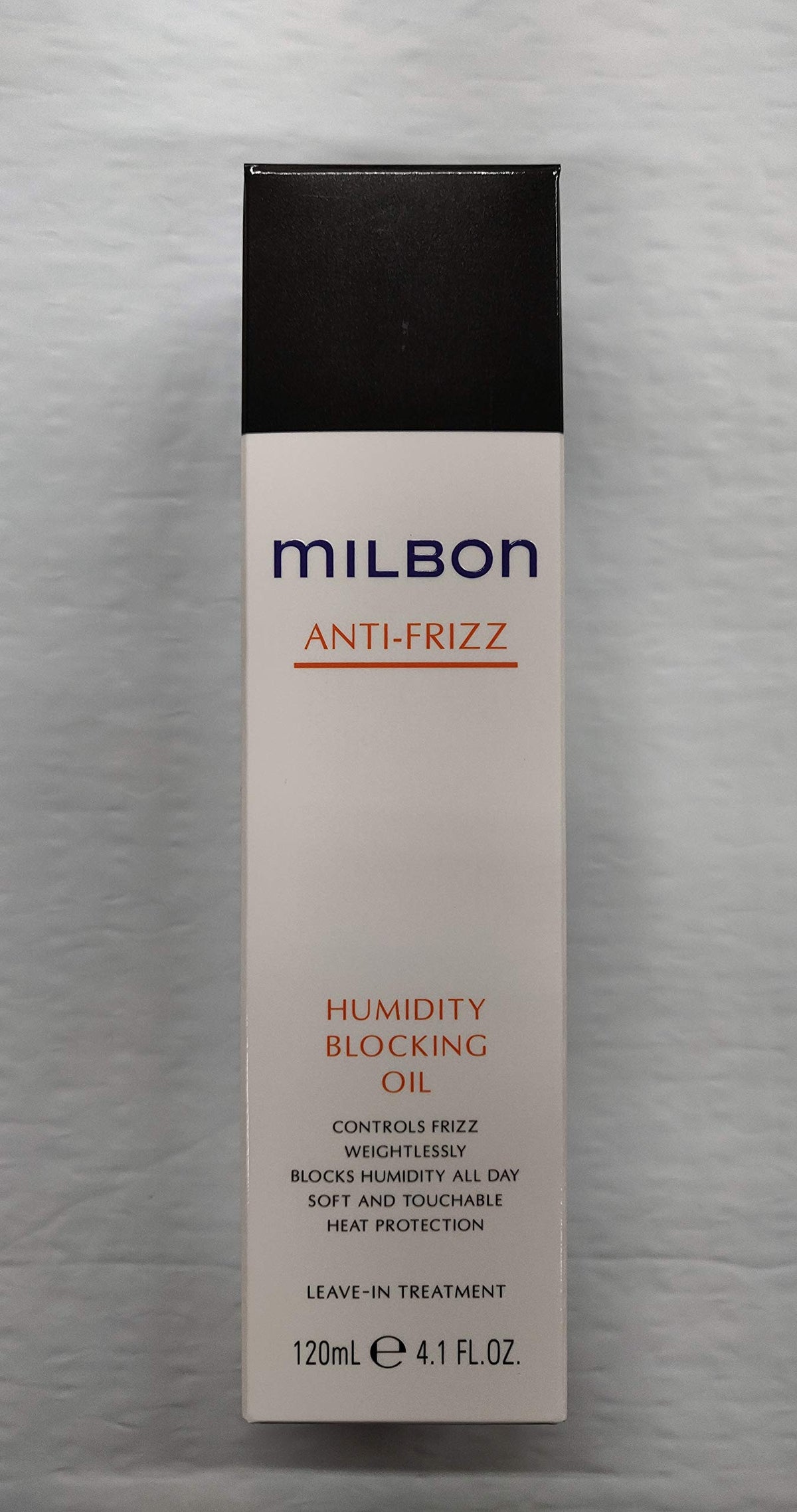 Milbon Anti-Frizz Oil bottle showing humidity-blocking, frizz-control for smooth waves.