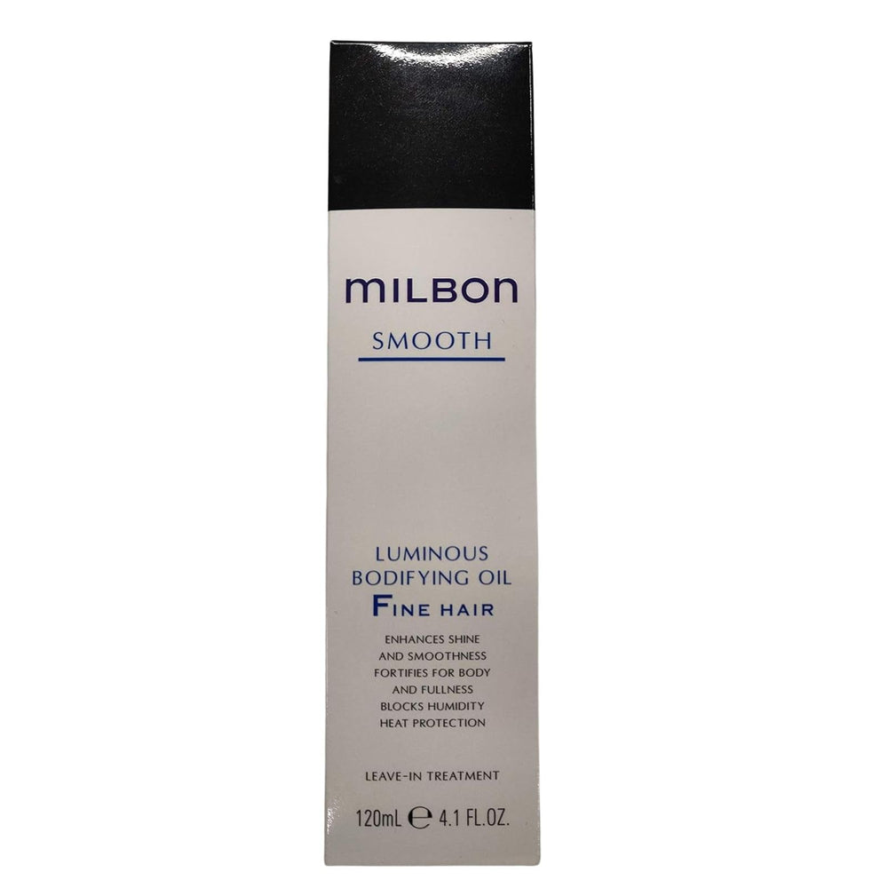 Milbon Smooth Luminous Bodifying Oil application scene showing hands applying for even distribution for smoother styling.