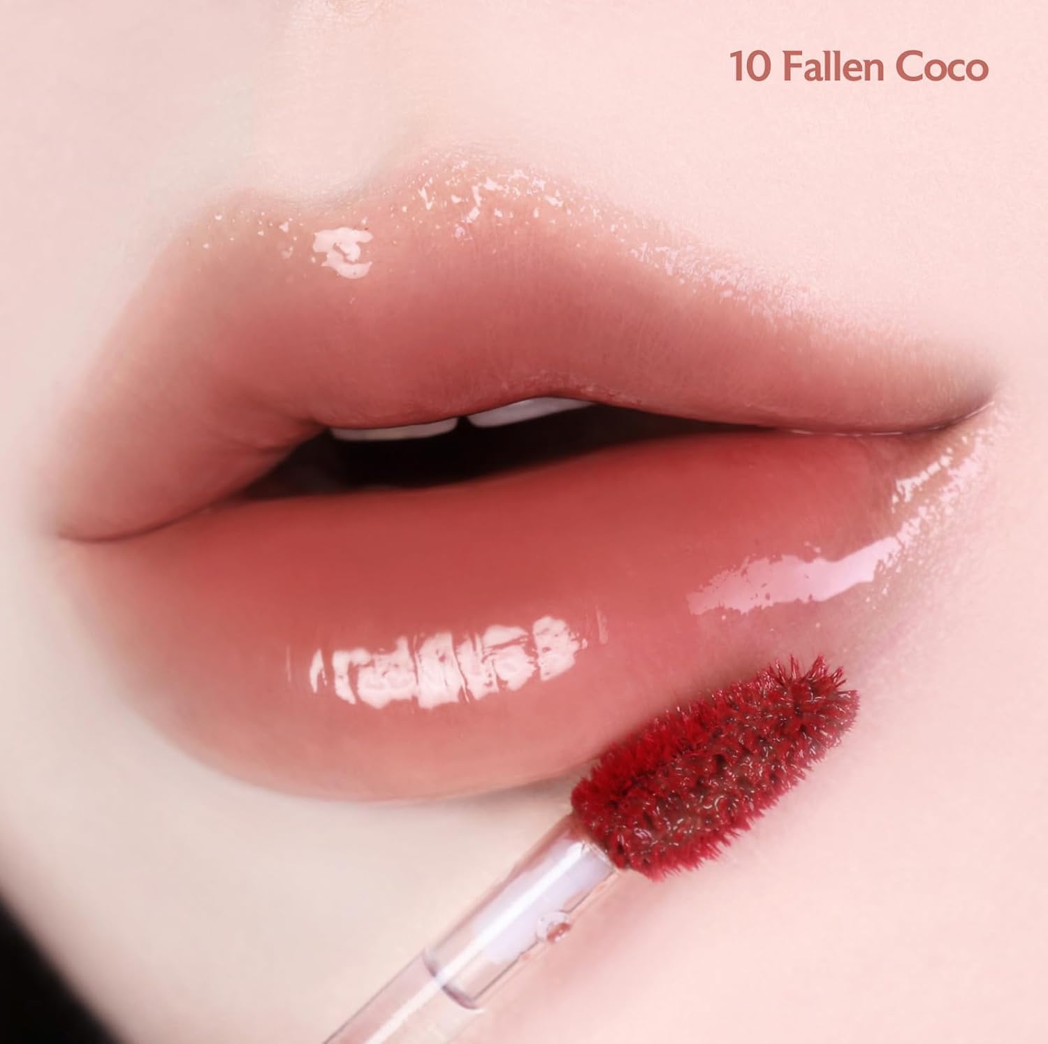 MILKTOUCH Jelly Fit Lip Tint Fallen Coco application gesture shows smooth, non-sticky coating.