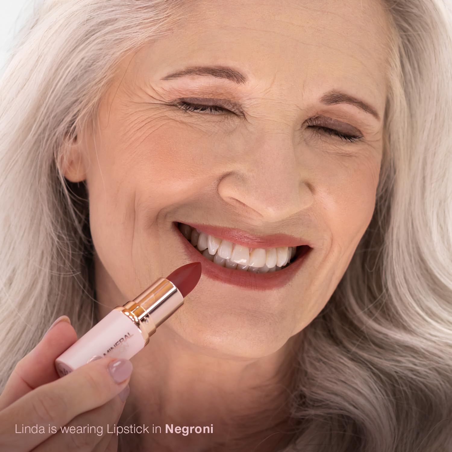 Mineral Fusion Lipstick Negroni application closeup demonstrates easy glide and moisture