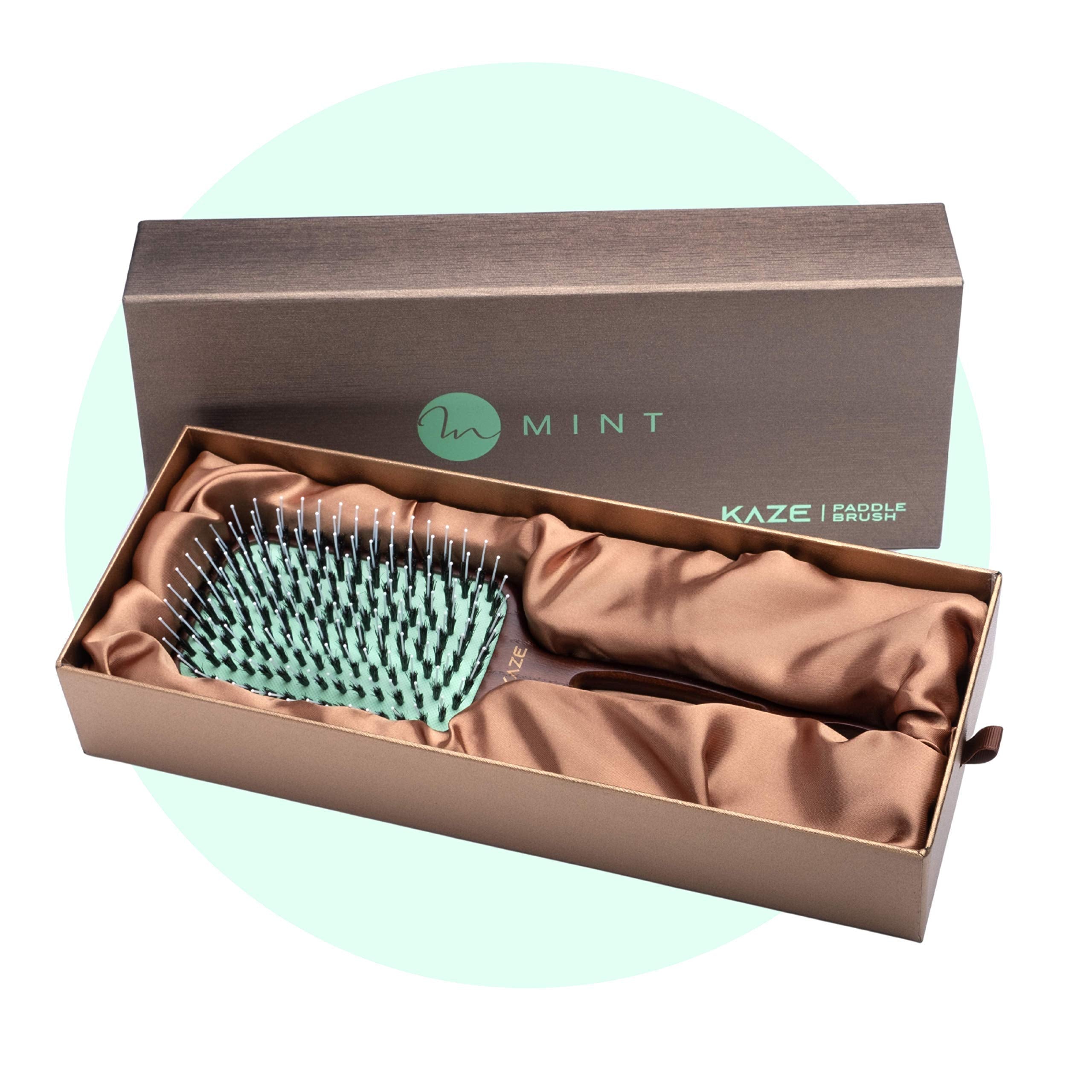 MINT extensions-friendly brush enabling gentle detangling without shedding or pulling.