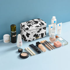 MIRASON cow print makeup bag medium open shows organized cosmetics on the go