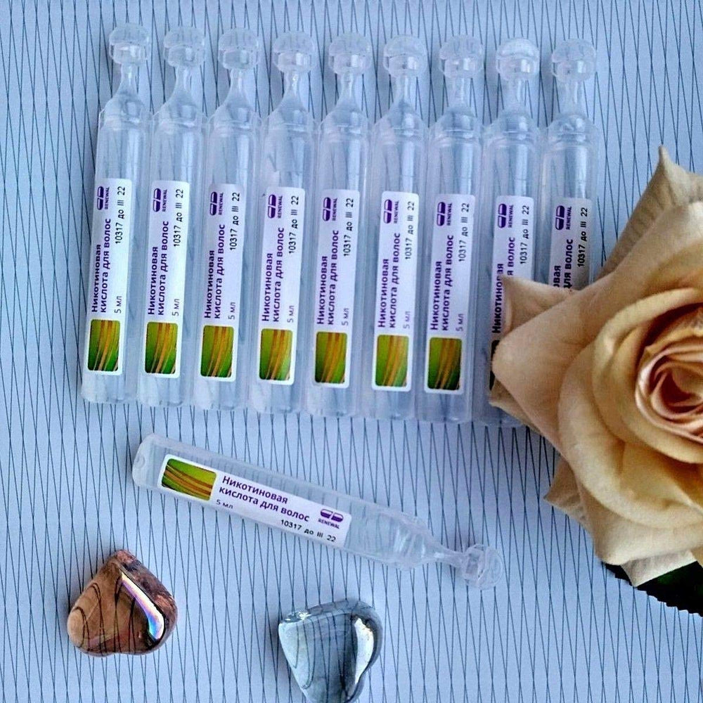 MIROLLA Nicotinic acid for hair ampules closeup shows colorless liquid for scalp nourishment.