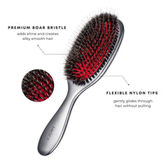 MIŠEL MISEL brush bristles in action smoothing hair with even oil spread.