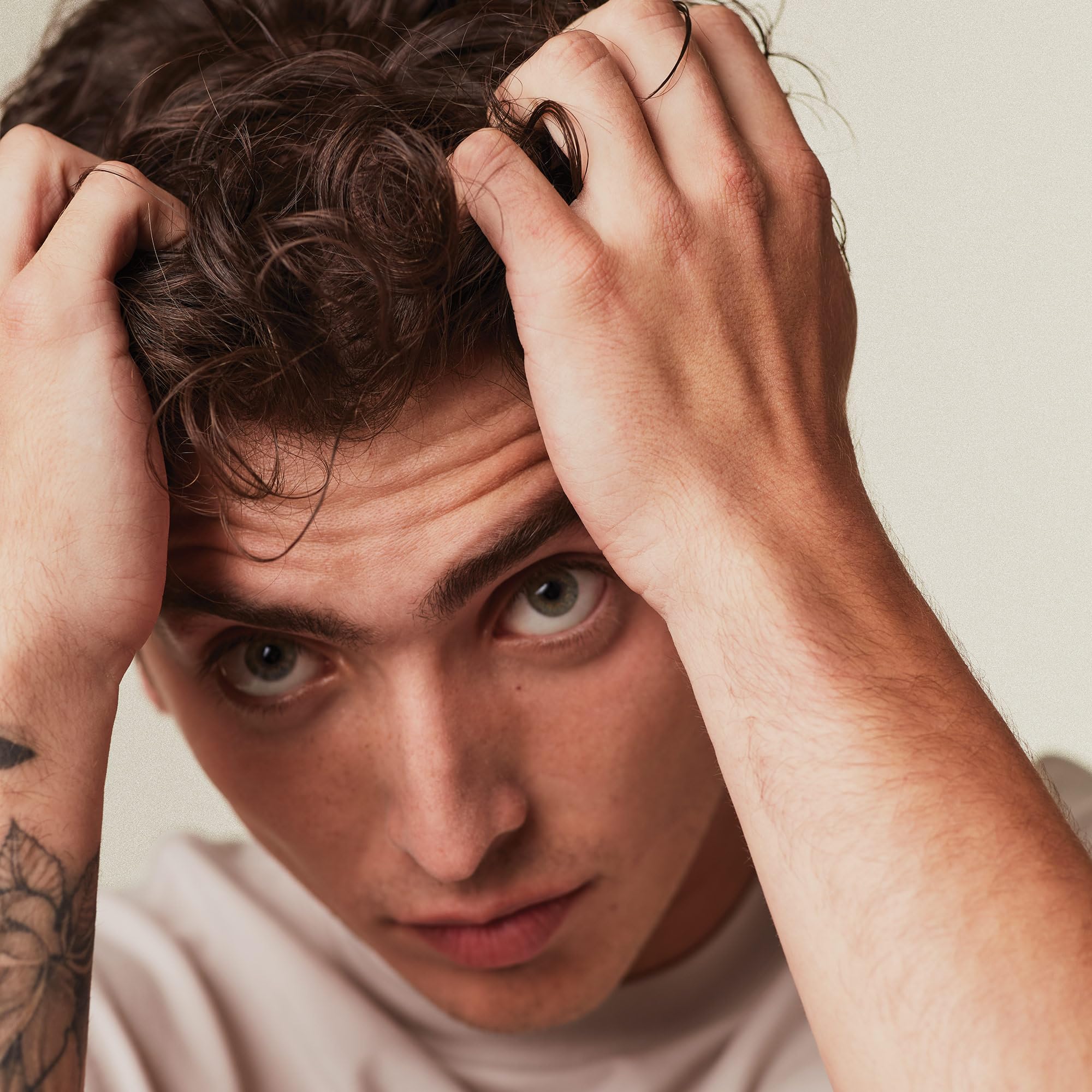 MITCH model styling image shows sculpted looks with high hold without stiffness.