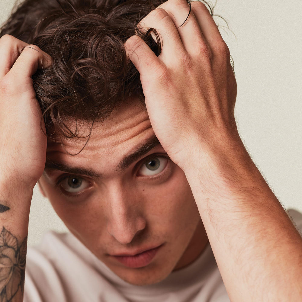 MITCH model styling image shows sculpted looks with high hold without stiffness.