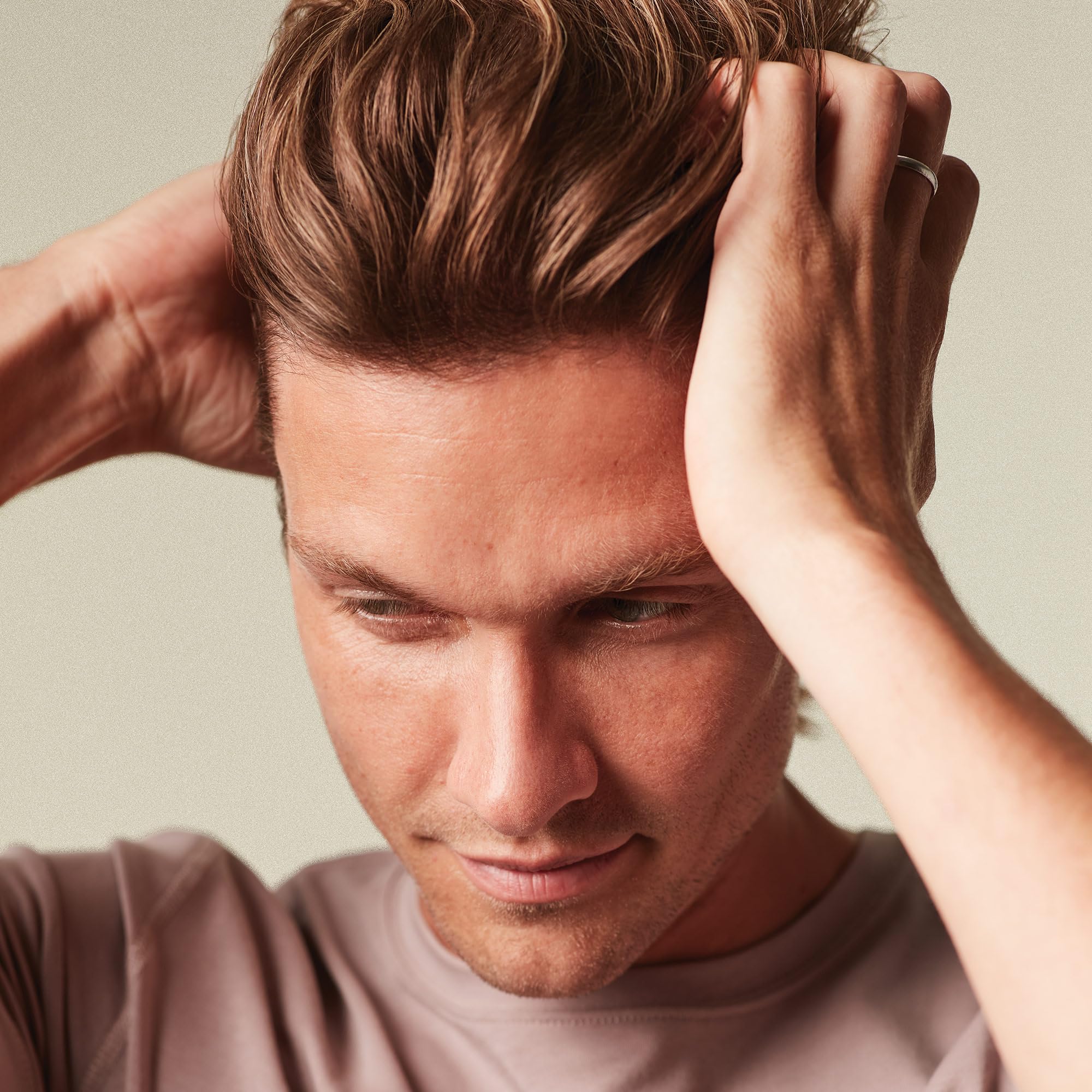 MITCH Reformer texture cream hands applying product for flexible hold