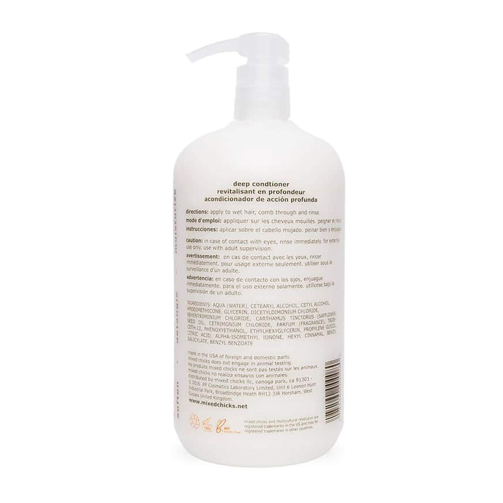 Mixed Chicks deep conditioner application hair scoop shows easy application and even moisture.