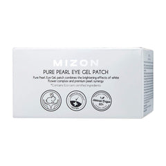 Applying MIZON Pure Pearl Eye Patch under the eye for refreshed appearance