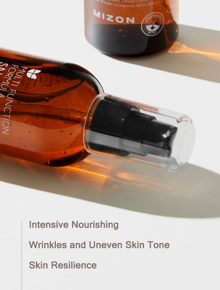 MIZON Snail Repair Intensive Essence palm application demonstrates quick, even coverage.