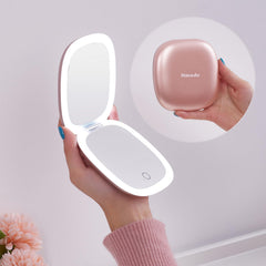 Mocado compact LED magnifying travel mirror front view, rose gold finish for on-the-go touch-ups.