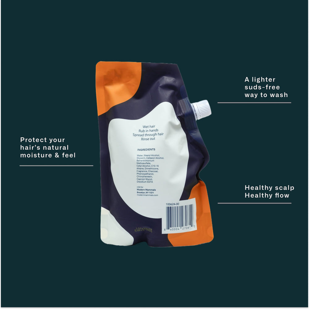 Modern Mammals Magic Mud 32oz tub shown for long-lasting all-in-one haircare.