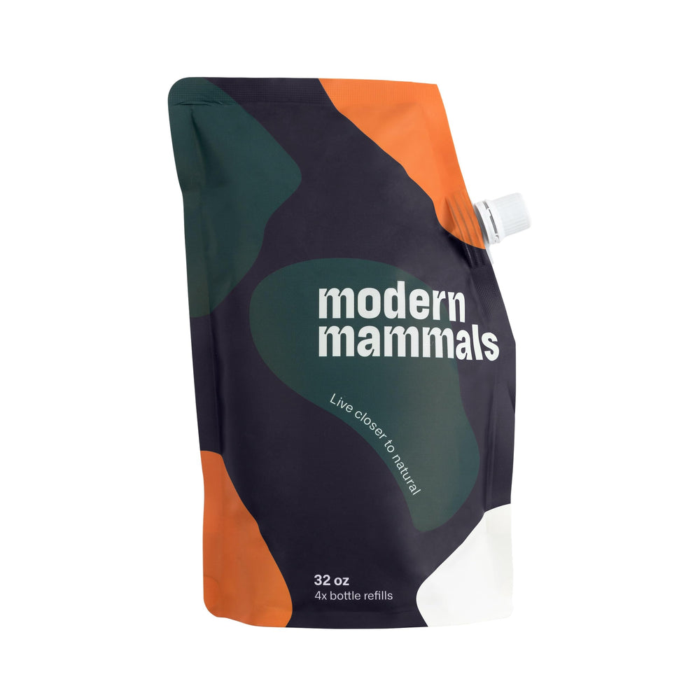 Modern Mammals Magic Mud bottle pour for gentle, sulfate-free cleansing.