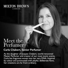 Molton Brown body wash in shower on loofah demonstrating easy foaming