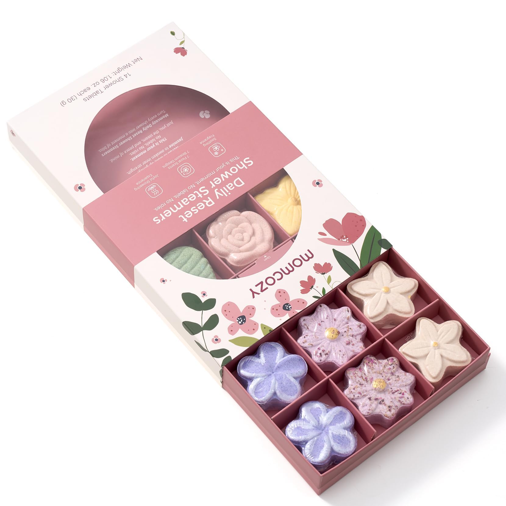 Momcozy steamers placed on a shower floor create a gentle scent during use.