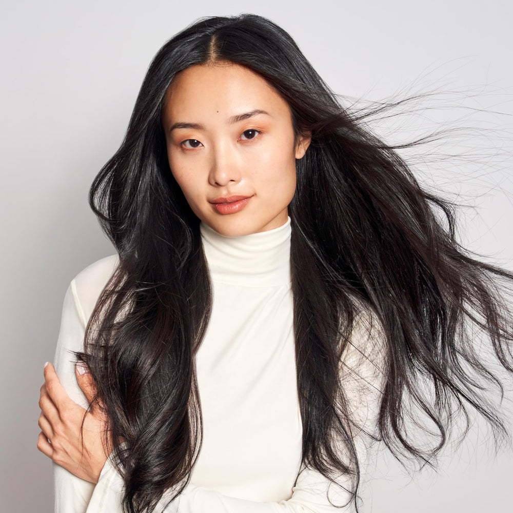 MONAT IR Clinical Thickening after-use hair glow suggests fuller, bouncier strands.
