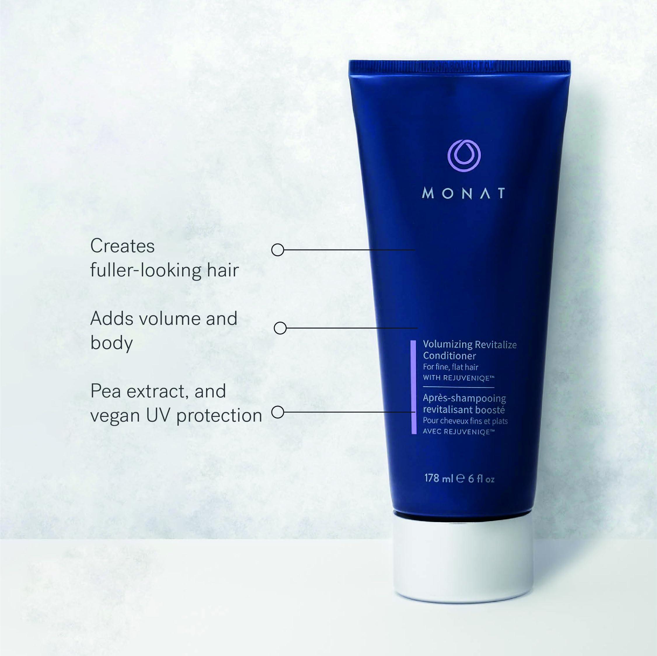 MONAT Volumizing Revitalize Conditioner bottle pour demonstrates easy application