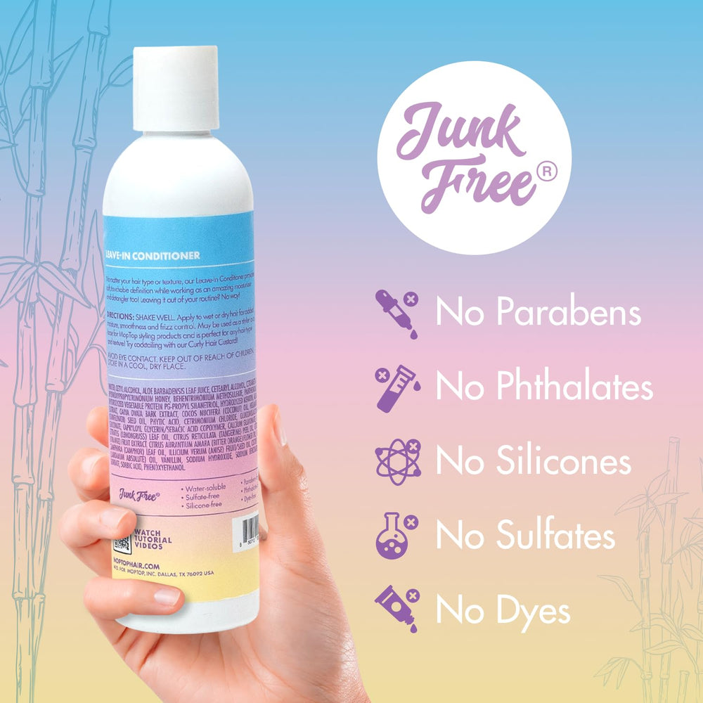 MopTop leave-in conditioner bottle closeup highlighting clean formula.