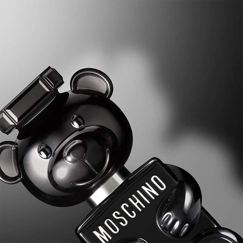Moschino Toy Boy base notes image—vetiver and sandalwood for lasting depth.
