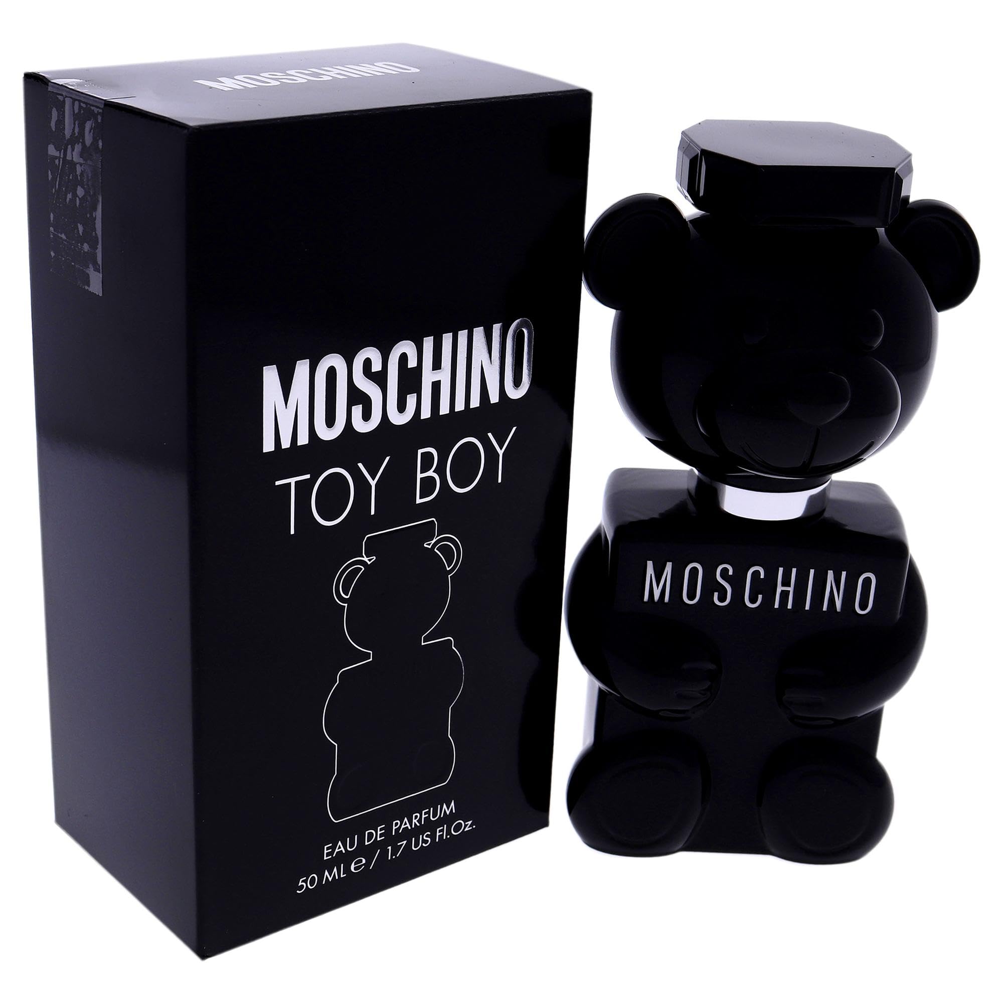Toy Boy bottle on black background suggests versatile modern scent.
