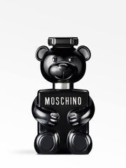 Moschino Toy Boy top notes image—pear and pink pepper for vibrant opening.
