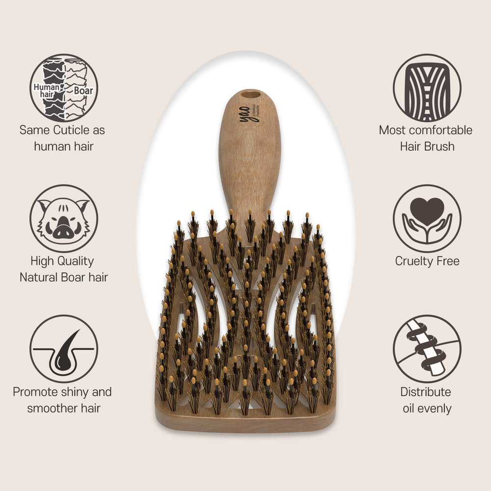 Mother's Corn Yao Boar Bristle Brush promotes even oil distribution for textured hair.